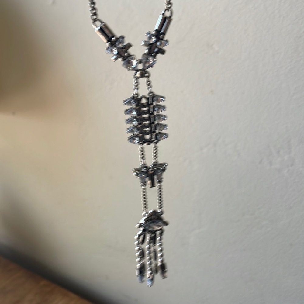 Silver crystal tribal looking necklace.